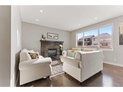 7 Copperleaf Terrace Se, Calgary, AB - Indoor Photo Showing Living Room With Fireplace