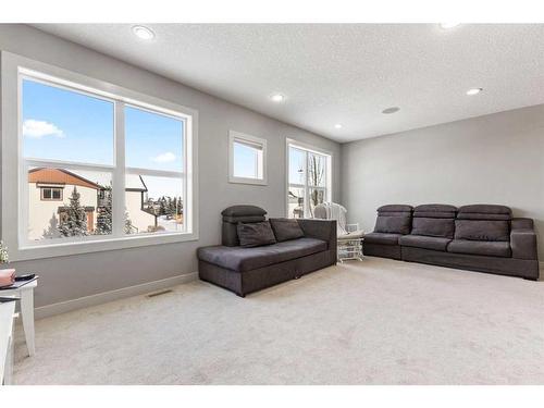 7 Copperleaf Terrace Se, Calgary, AB - Indoor Photo Showing Living Room