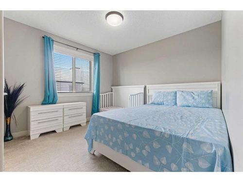 7 Copperleaf Terrace Se, Calgary, AB - Indoor Photo Showing Bedroom