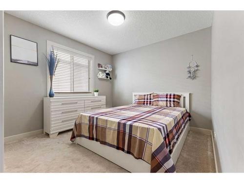 7 Copperleaf Terrace Se, Calgary, AB - Indoor Photo Showing Bedroom