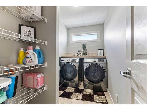 7 Copperleaf Terrace Se, Calgary, AB - Indoor Photo Showing Laundry Room