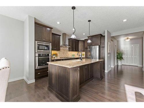 7 Copperleaf Terrace Se, Calgary, AB - Indoor Photo Showing Kitchen With Upgraded Kitchen