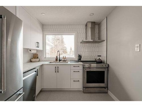 47 Henefer Road Sw, Calgary, AB - Indoor Photo Showing Kitchen With Stainless Steel Kitchen