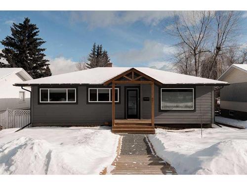 47 Henefer Road Sw, Calgary, AB - Outdoor With Facade