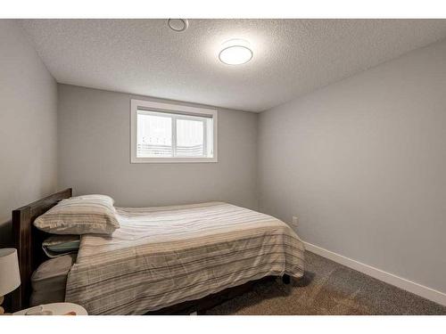 47 Henefer Road Sw, Calgary, AB - Indoor Photo Showing Bedroom