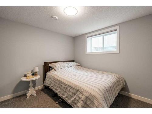 47 Henefer Road Sw, Calgary, AB - Indoor Photo Showing Bedroom