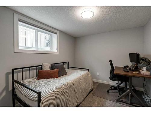 47 Henefer Road Sw, Calgary, AB - Indoor Photo Showing Bedroom