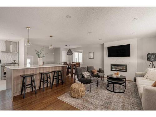 47 Henefer Road Sw, Calgary, AB - Indoor Photo Showing Living Room With Fireplace