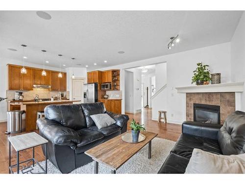 43 Elgin Terrace Se, Calgary, AB - Indoor Photo Showing Living Room With Fireplace