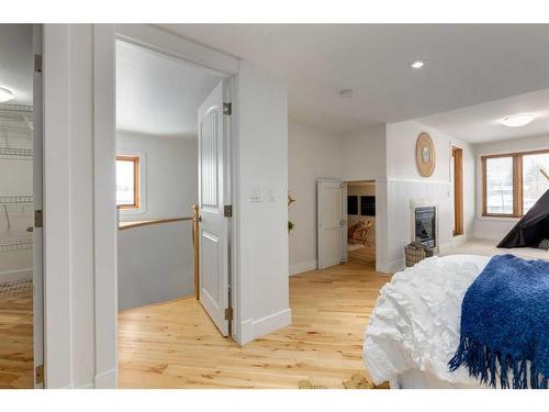 2325 22 Avenue Sw, Calgary, AB - Indoor Photo Showing Bedroom With Fireplace