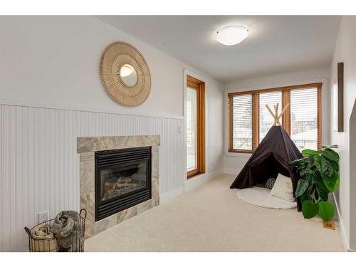 2325 22 Avenue Sw, Calgary, AB - Indoor Photo Showing Living Room With Fireplace