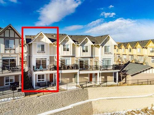 33 Sherwood Lane Nw, Calgary, AB - Outdoor With Balcony With Facade