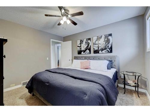 939 Cannock Road Sw, Calgary, AB - Indoor Photo Showing Bedroom