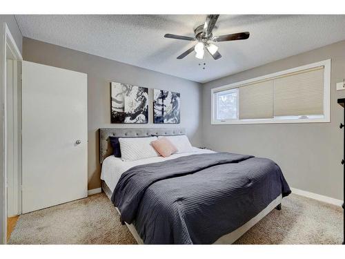 939 Cannock Road Sw, Calgary, AB - Indoor Photo Showing Bedroom