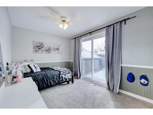 939 Cannock Road Sw, Calgary, AB - Indoor Photo Showing Bedroom