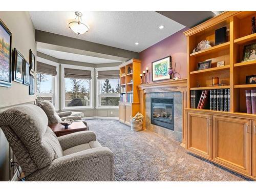 22 Strathridge Grove Sw, Calgary, AB - Indoor Photo Showing Other Room With Fireplace