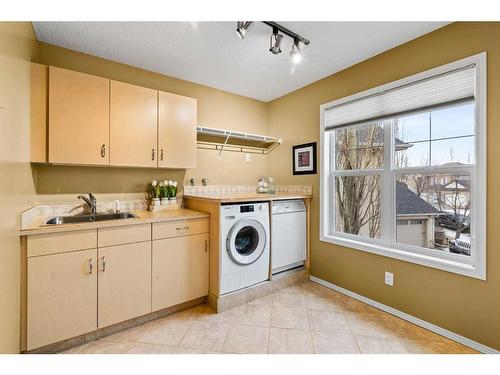 22 Strathridge Grove Sw, Calgary, AB - Indoor Photo Showing Laundry Room