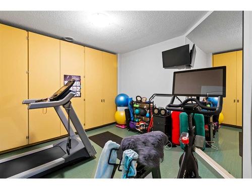 22 Strathridge Grove Sw, Calgary, AB - Indoor Photo Showing Gym Room