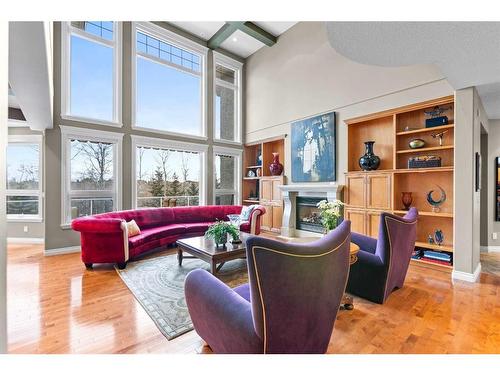 22 Strathridge Grove Sw, Calgary, AB - Indoor Photo Showing Living Room With Fireplace