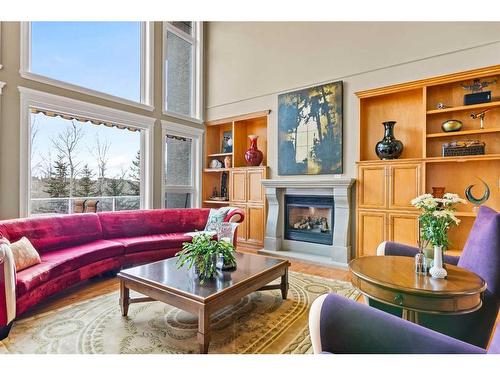 22 Strathridge Grove Sw, Calgary, AB - Indoor Photo Showing Living Room With Fireplace