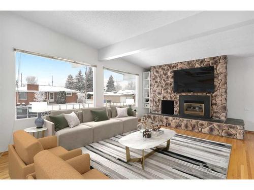 1015 Motherwell Road Ne, Calgary, AB - Indoor Photo Showing Living Room With Fireplace