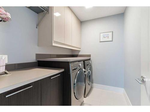 120 Burma Star Road Sw, Calgary, AB - Indoor Photo Showing Laundry Room