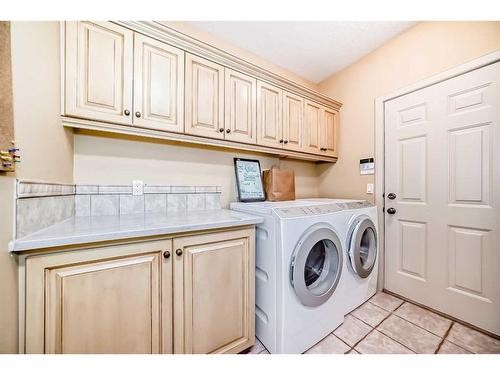 46 Valley Ponds Way Nw, Calgary, AB - Indoor Photo Showing Laundry Room