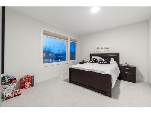 41 Aspen Ridge Terrace Sw, Calgary, AB - Indoor Photo Showing Bedroom