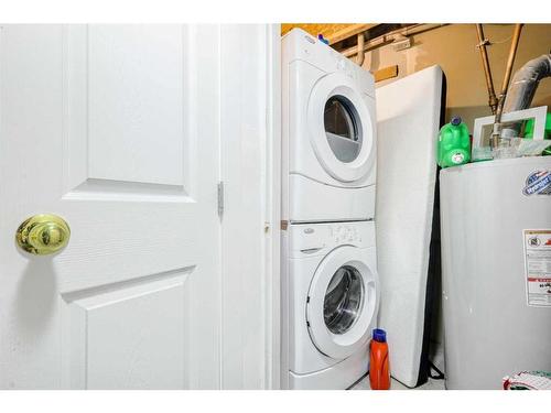 30 Saddlemead Way Ne, Calgary, AB - Indoor Photo Showing Laundry Room