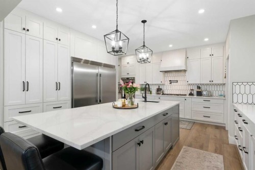 116 Centre Avenue Ne, Airdrie, AB - Indoor Photo Showing Kitchen With Upgraded Kitchen