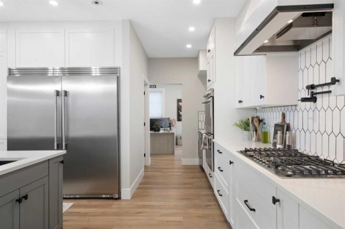 116 Centre Avenue Ne, Airdrie, AB - Indoor Photo Showing Kitchen With Upgraded Kitchen