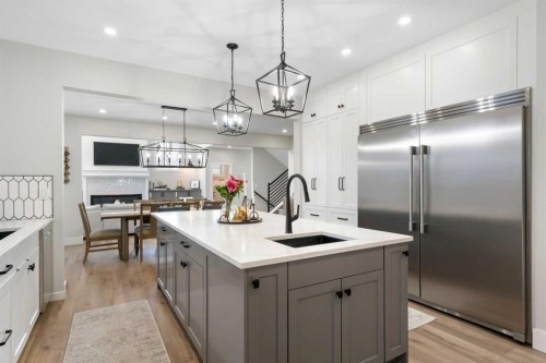 116 Centre Avenue Ne, Airdrie, AB - Indoor Photo Showing Kitchen With Upgraded Kitchen