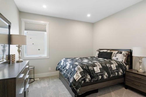 116 Centre Avenue Ne, Airdrie, AB - Indoor Photo Showing Bedroom