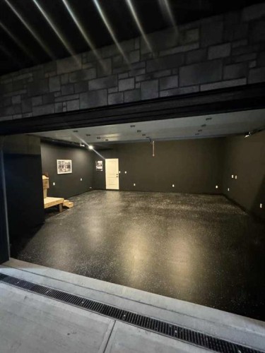 116 Centre Avenue Ne, Airdrie, AB - Indoor Photo Showing Garage
