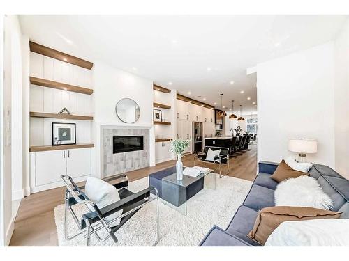 222 28 Avenue Nw, Calgary, AB - Indoor Photo Showing Living Room With Fireplace