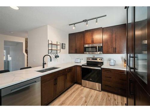 89 Aspen Hills Terrace Sw, Calgary, AB - Indoor Photo Showing Kitchen With Stainless Steel Kitchen With Double Sink