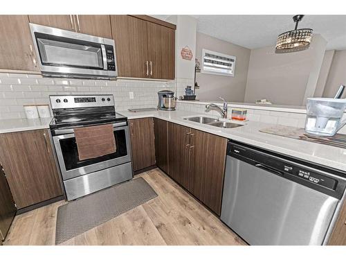 266 Cityscape Boulevard Ne, Calgary, AB - Indoor Photo Showing Kitchen With Stainless Steel Kitchen With Double Sink