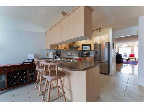 6416 Sierra Morena Boulevard Sw, Calgary, AB - Indoor Photo Showing Kitchen With Double Sink