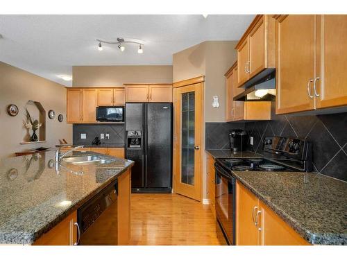 42 Wentworth Landing Sw, Calgary, AB - Indoor Photo Showing Kitchen With Double Sink