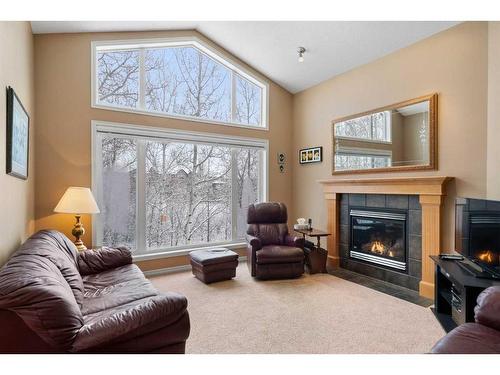 42 Wentworth Landing Sw, Calgary, AB - Indoor Photo Showing Living Room With Fireplace