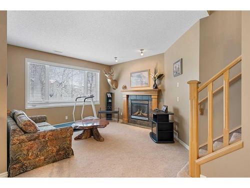 42 Wentworth Landing Sw, Calgary, AB - Indoor Photo Showing Other Room With Fireplace