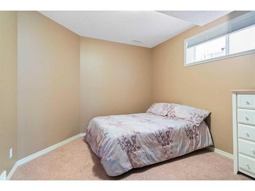 42 Wentworth Landing Sw, Calgary, AB - Indoor Photo Showing Bedroom