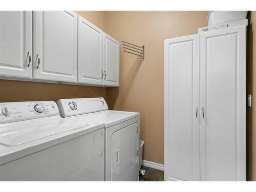 42 Wentworth Landing Sw, Calgary, AB - Indoor Photo Showing Laundry Room