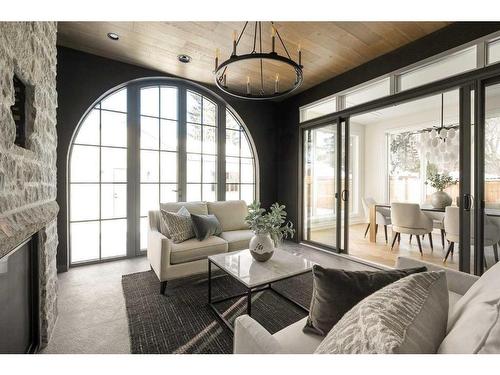 4216 5A Street Sw, Calgary, AB - Indoor Photo Showing Living Room With Fireplace