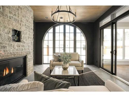 4216 5A Street Sw, Calgary, AB - Indoor Photo Showing Living Room With Fireplace