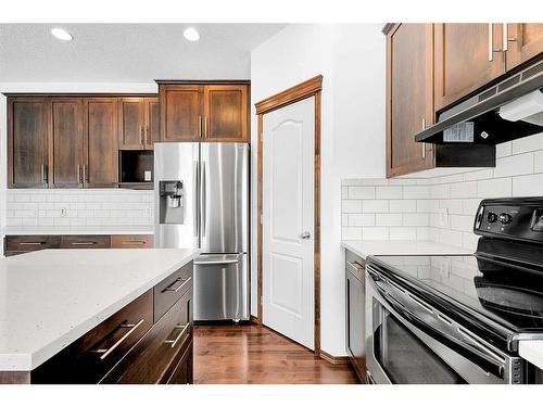 86 Tuscany Reserve Rise Nw, Calgary, AB - Indoor Photo Showing Kitchen With Stainless Steel Kitchen