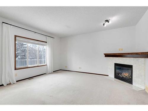 86 Tuscany Reserve Rise Nw, Calgary, AB - Indoor With Fireplace