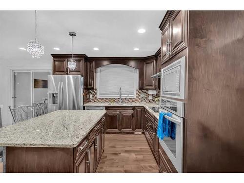 748 Rundleridge Drive Ne, Calgary, AB - Indoor Photo Showing Kitchen With Upgraded Kitchen