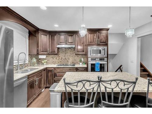 748 Rundleridge Drive Ne, Calgary, AB - Indoor Photo Showing Kitchen With Double Sink With Upgraded Kitchen