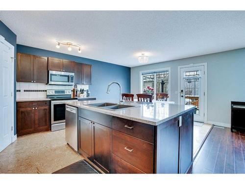 178 Citadel Estates Heights Nw, Calgary, AB - Indoor Photo Showing Kitchen With Double Sink